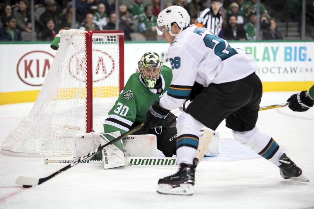 Dallas Stars’ goaltender Ben Bishop defends the goal against San Jose Sharks’ right wing Timo Meier during their NHL game at the American Airlines Center in Dallas Friday. — Reuters