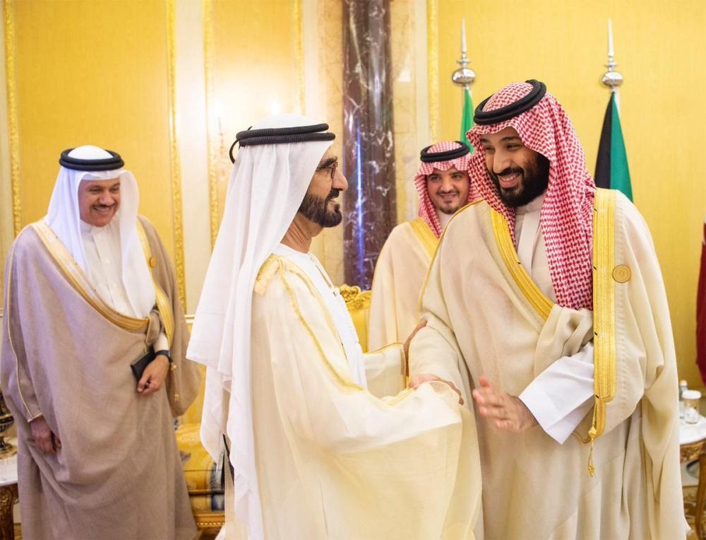 Custodian of the Two Holy Mosques King Salman listens to Crown Prince Muhammad Bin Salman, deputy premier and minister of defense, during the opening of the 39th session of the GCC summit in Riyadh on Sunday. — SPA