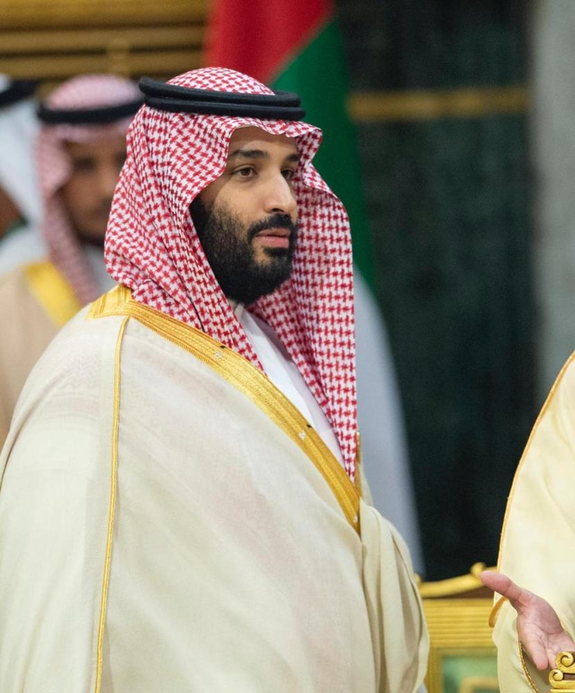 Custodian of the Two Holy Mosques King Salman listens to Crown Prince Muhammad Bin Salman, deputy premier and minister of defense, during the opening of the 39th session of the GCC summit in Riyadh on Sunday. — SPA