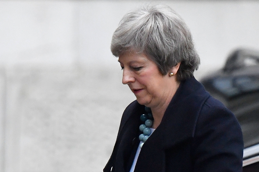 British Prime Minister Theresa May returns to Downing Street in London on Monday. — Reuters