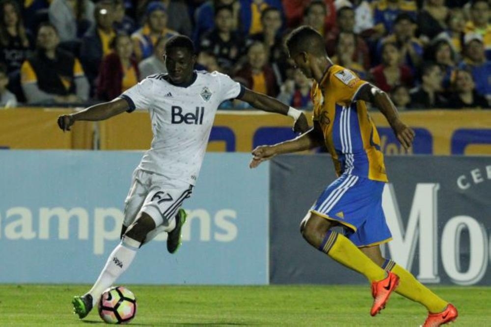 Francisco Meza (R) of Mexico's Tigres and Alphonso Davies of Canada's Vancouver Whitecaps in action during the CONCACAF Champions League clash at the Universitario stadium, Monterrey, Mexico, in this file photo. — Reuters