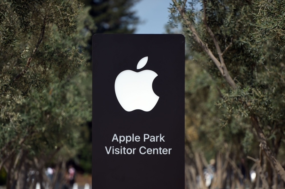 In this file photo, a sign shows the new Apple Park Visitor Center at Apple's new headquarters in Cupertino, California. Apple unveiled plans on Thursday, for a $1 billion campus in Texas that will create jobs for the tech giant outside Silicon Valley, a move made without the fanfare of the recent Amazon headquarters bidding war. The new campus — for engineering other functions, but not manufacturing — will be near the tech giant's existing facility in Austin and initially accommodate 5,000 new employees, with room to grow to 15,000. — AFP 