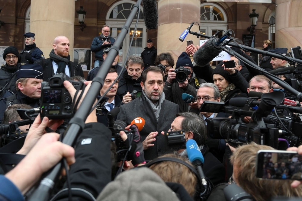 French Interior Minister Christophe Castaner, center, gives a press conference in Strasbourg, eastern France, on Friday as the Christmas market reopens after the author of the attack was killed on Thursday. — AFP