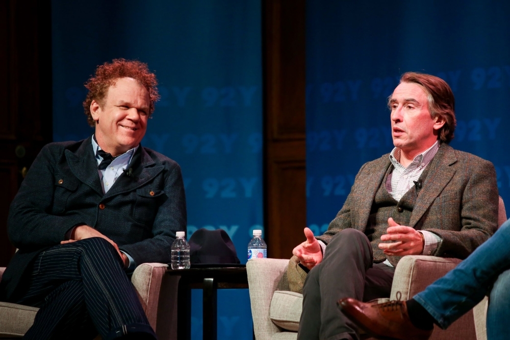 US actor John C. Reilly (L) and British actor Steve Coogan (R) speak during a screening of the movie 