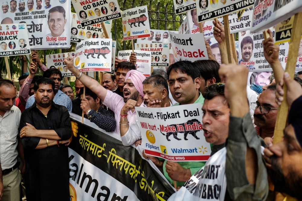 Indian protesters take part in a demonstration against a deal between US retail giant Walmart and Indian online sales company Flipkart in New Delhi in this May 12, 2018 file photo. — AFP