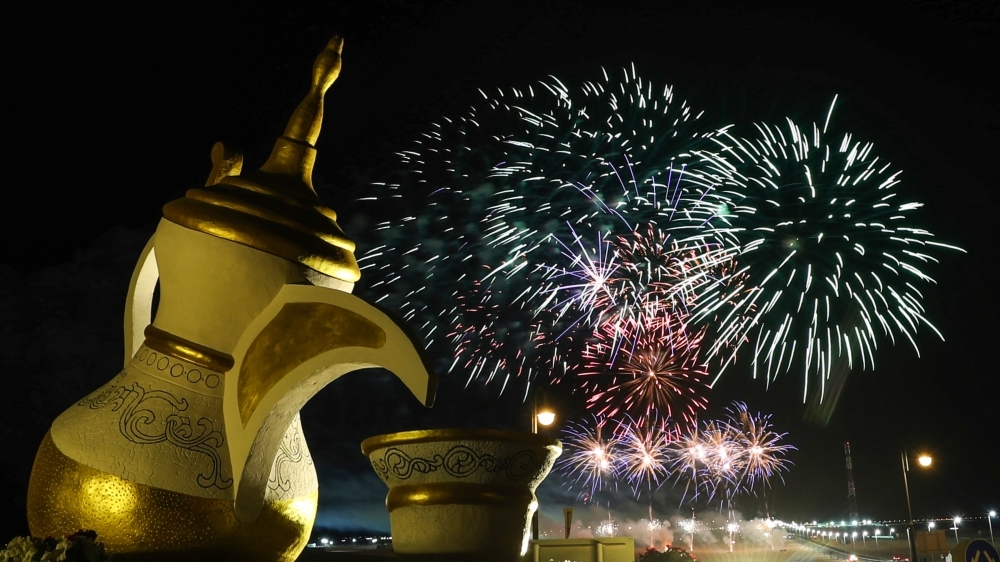 Fireworks light up the sky around the London Eye wheel to welcome the New Year in London. — Reuters