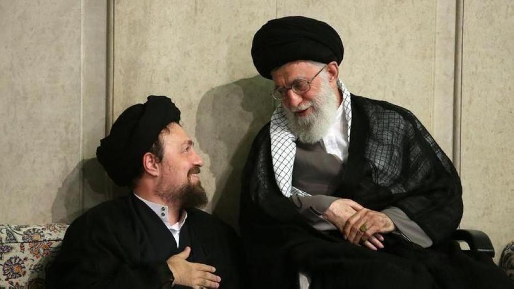 


File photo of Hassan Khomeini (left) with Supreme Leader Ali Khameini