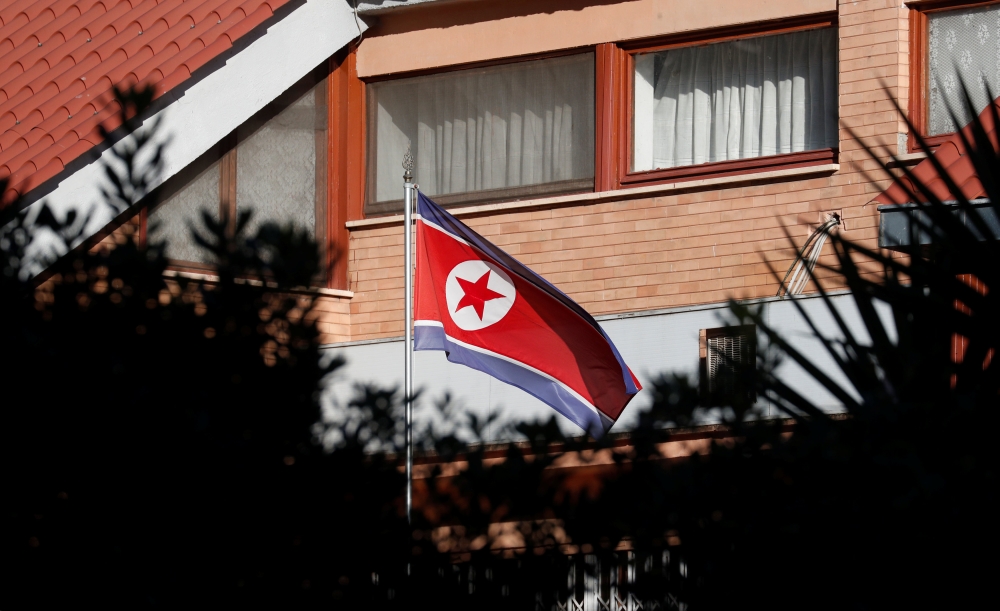 The flag of North Korea flutters in front of its embassy in Rome, Italy, on Thursday. — Reuters
