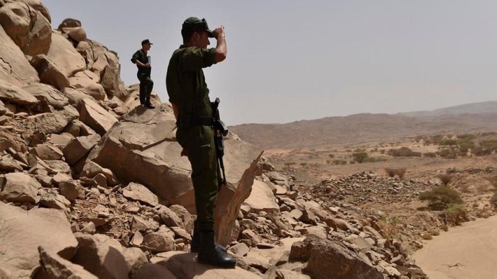 File photo of Algerian security members patrol in Tamanrasset desert, 2,000 km south of Algiers. — AFP 