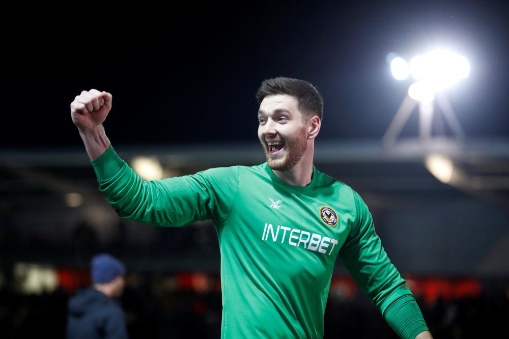Newport County's Joe Day celebrates after the FA Cup match against Leicester City at Rodney Parade, Newport, Sunday. — Reuters