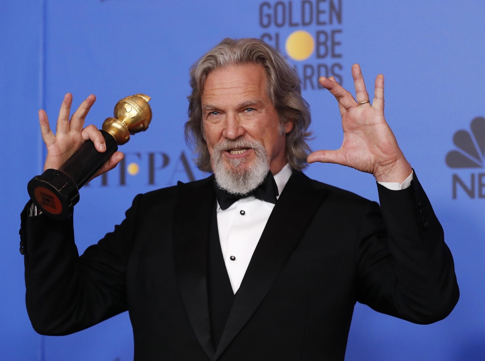 Jeff Bridges poses backstage with his Cecil B. Demille award. at the 76th Golden Globe Awards in Beverly Hills, California, US, on Sunday. — Reuters 