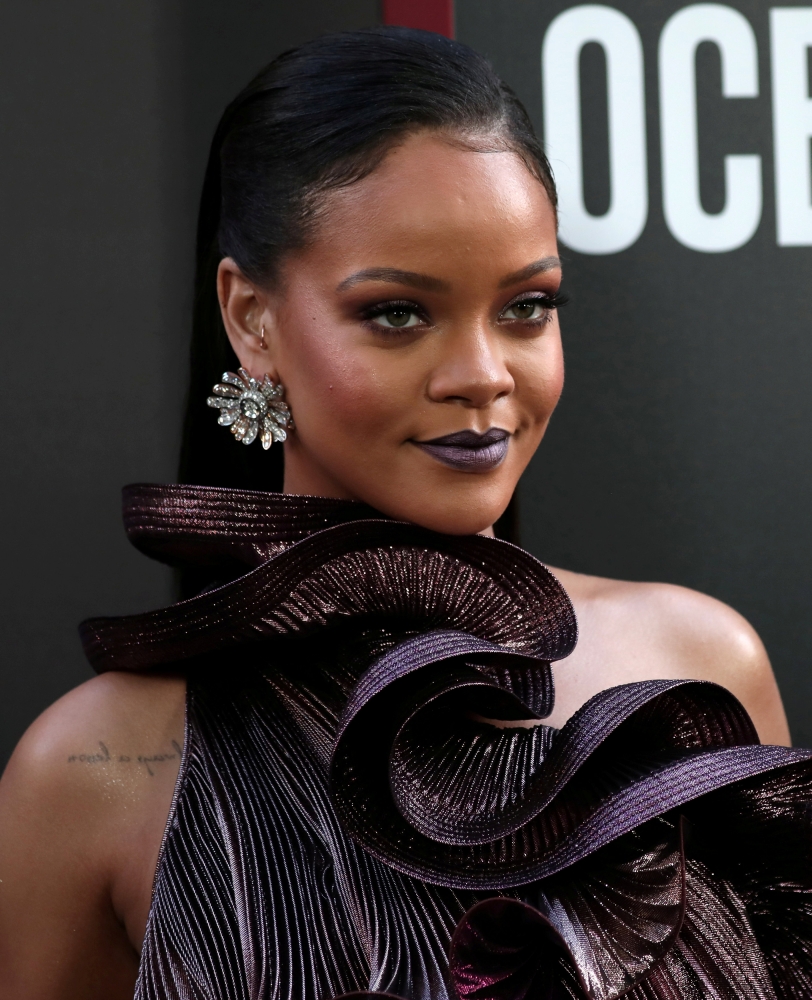 FILE PHOTO: Cast member Rihanna poses as she arrives at the world premiere of the film 