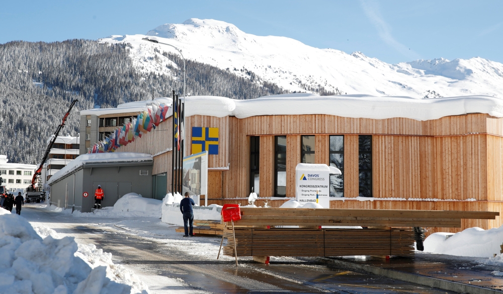 Snow-covered mountains are seen behind the congress center, the venue of the World Economic Forum (WEF) in Davos, Switzerland, on Tuesday. — Reuters