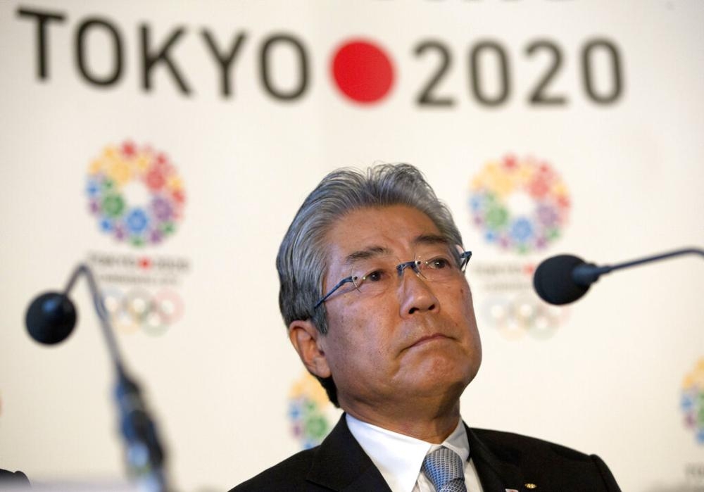 In this file photo of Tsunekazu Takeda, president of the Tokyo 2020 Olympic Games bid, listens to a question from the media during their first international presentation of the Tokyo 2020 Olympic Games bid in London. 