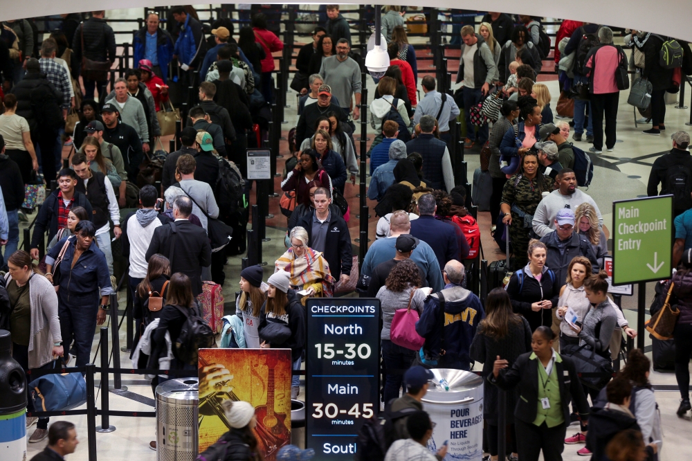 Long lines are seen at a Transportation Security Administration (TSA) security checkpoint at Hartsfield-Jackson Atlanta International Airport amid the partial federal government shutdown, in Atlanta, Georgia, on Friday. — Reuters
