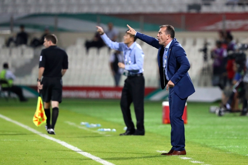 Lebanon's Montenegrin coach Miodrag Radulovich gives his instructions during the 2019 AFC Asian Cup group E football match between Lebanon and North Korea at the Sharjah Stadium in Sharjah on Thursday.  — AFP