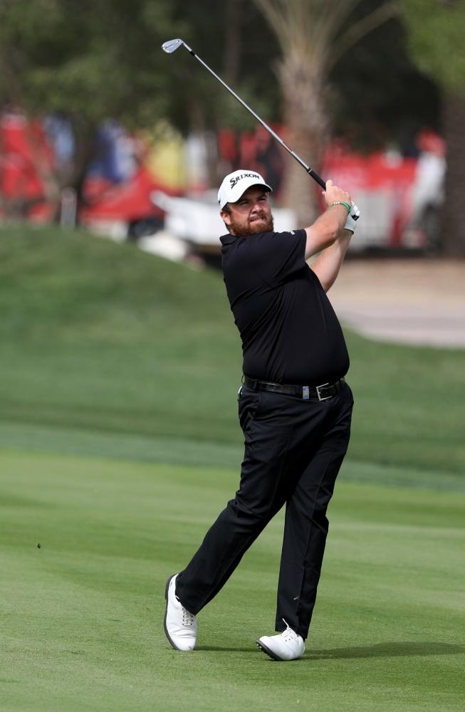 Shane Lowry of Ireland plays a shot during day four of the Abu Dhabi Golf Championship at the Abu Dhabi Golf Club Saturday. — AFP