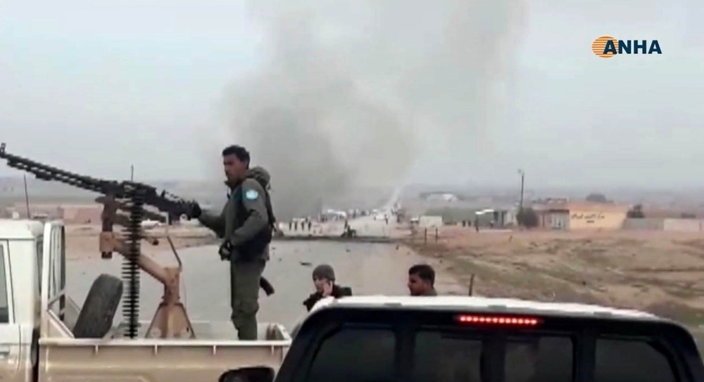 An image grab taken from a video published by Hawar News Agency (ANHA) on Monday shows the scene of a suicide car bomb attack on a military convoy on a road in Syria's northeastern Hasakeh province, which killed five members of a Kurdish-led force accompanying US-led coalition troops. — AFP
