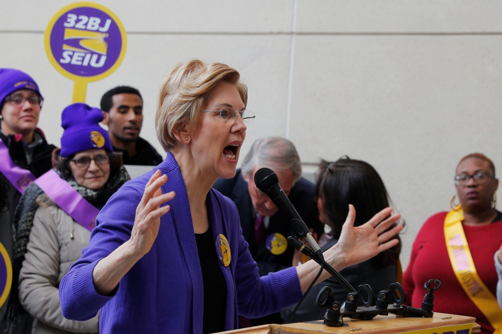 Potential 2020 Democratic presidential candidate and US Senator Elizabeth Warren (D-MA) speaks about federal government employees working without pay and workers trying to unionize at Logan Airport in Boston, Massachusetts, on Monday. — Reuters