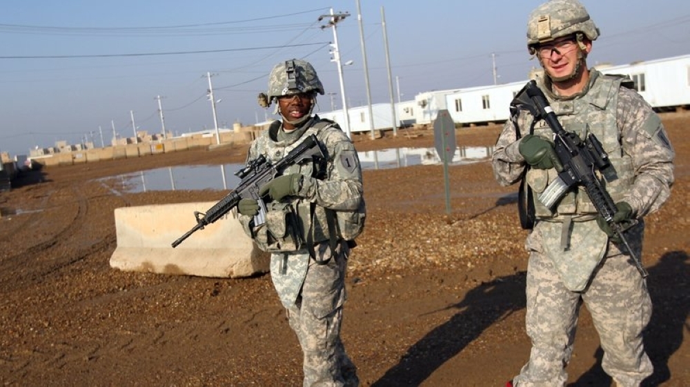 


US soldiers patrol the Taji base complex, which hosts Iraqi and US troops north of the capital Baghdad. Taji is one of an eventual five sites where the US and allied countries aim to train 5,000 Iraqi military personnel every six to eight weeks for combat against Daesh (so-called IS) militia. — File photo