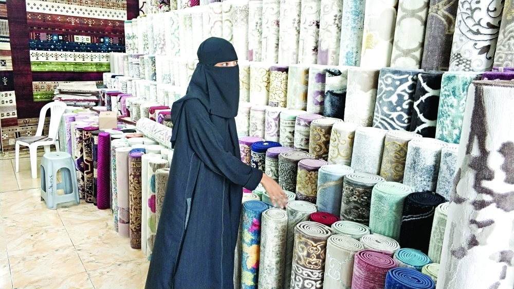 


Saudi employees in carpet showrooms complain about their work conditions. — Courtesy Al-Madina