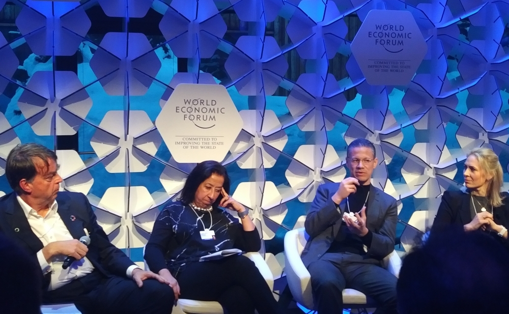 Badr Jafar, Chief Executive Officer of Crescent Enterprises and Managing Director of the Crescent Group, (second from right); Lubna Olayan, Chief Executive Officer of Olayan Financing Company (second from left) during the panel discussion at the World Economic Forum in Davos, Switzerland


