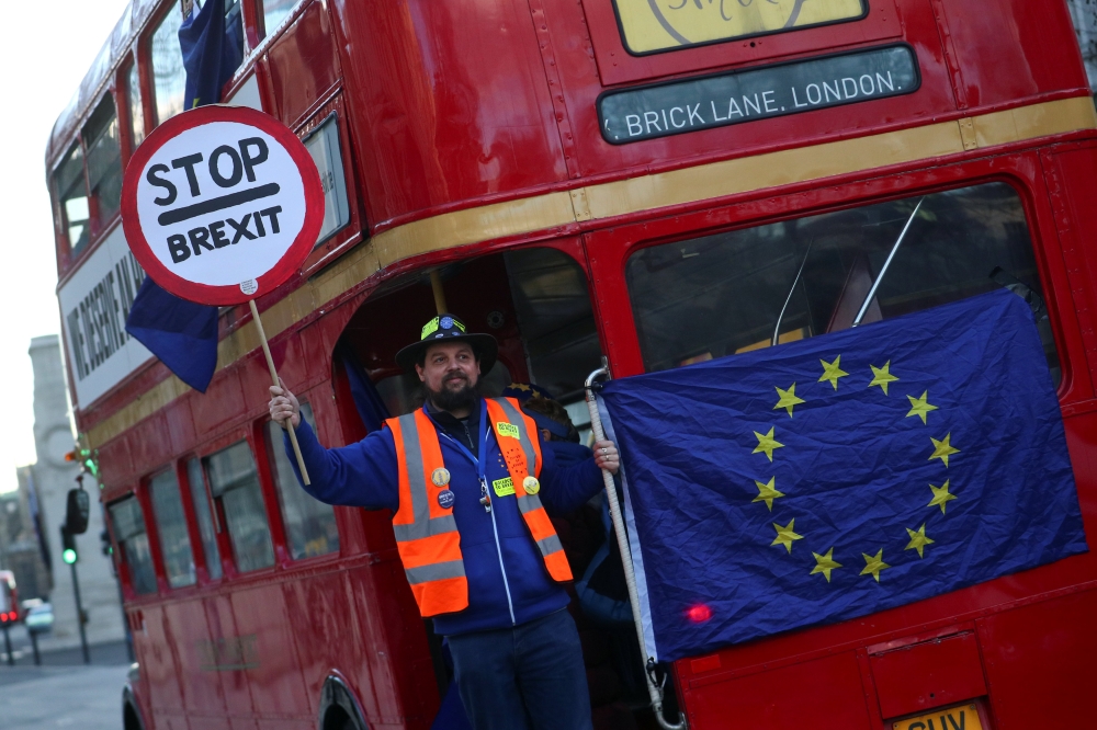 An anti-Brexit protesters' bus drives on Whitehall in London, Britain on Monday. — Reuters