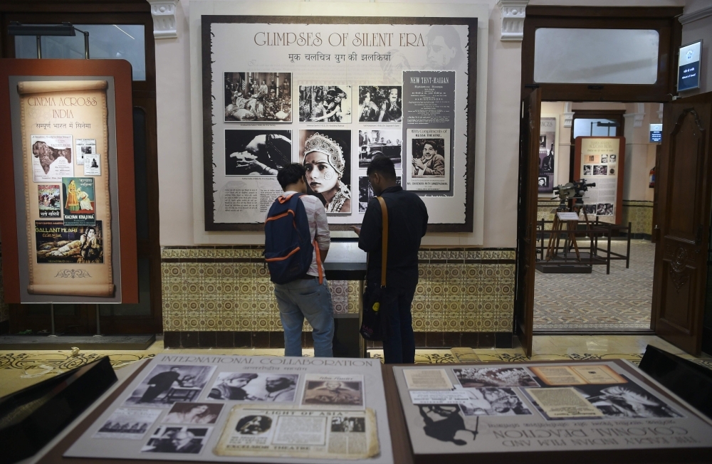 A visitor walks past exhibits at the National Museum of Indian Cinema (NMIC), the country's first museum showcasing the history of its film industry, in Mumbai. — AFP