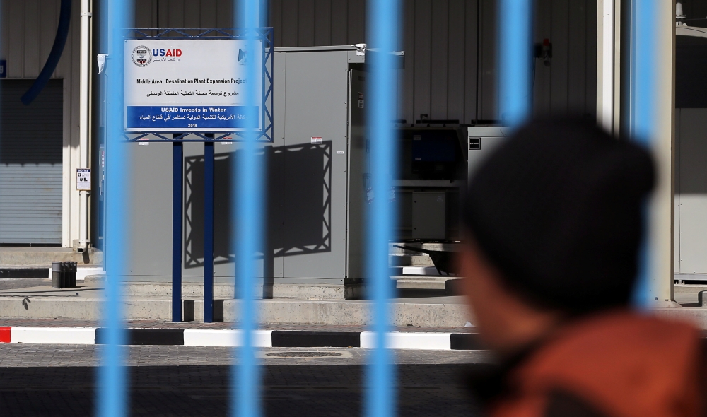 A sign of a US Agency for International Development (USAID) is seen at water desalination plant in the central Gaza Strip on Friday. — Reuters