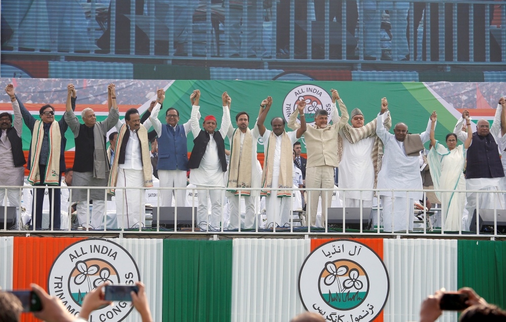 File photo shows leaders of India's main opposition parties join their hands together during 