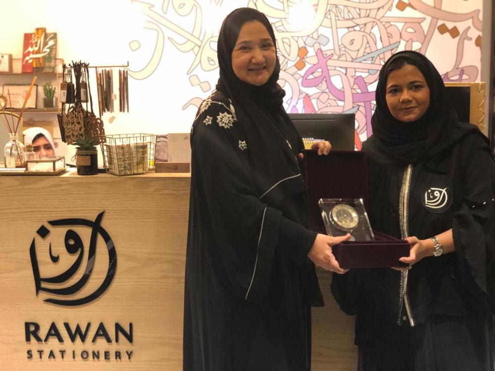 


Rawan Khogeer celebrates the first anniversary of Rawan Stationery Store’s opening with Dar Al-Hekma president, staff and students.