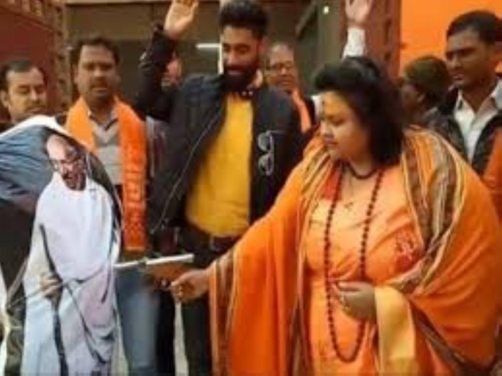 File photo shows Pooja Shakun Pandey shooting the effigy of Mahatma Gandhi at an event by a far-right Hindu group.