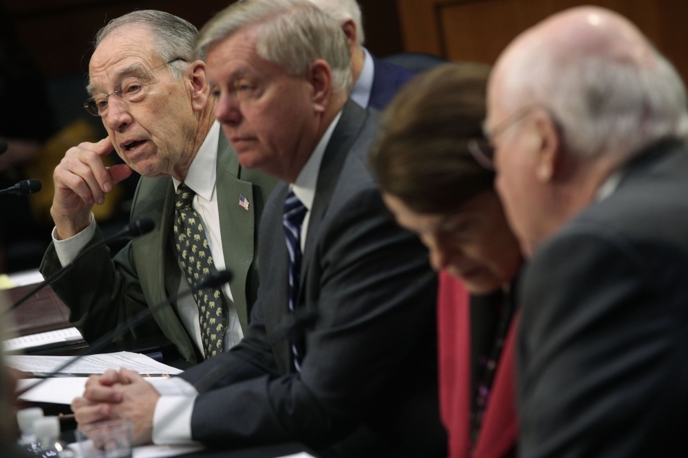 (L-R) US Sen. Chuck Grassley (R-IA) speaks as committee chairman Sen. Lindsey Graham (R-SC), ranking member Sen. Dianne Feinstein (D-CA) and Sen. Patrick Leahy (D-VT) listen during a meeting of the Senate Judiciary Committee at the Hart Senate Office Building on Capitol Hill in Washington, DC on Thursday. — AFP