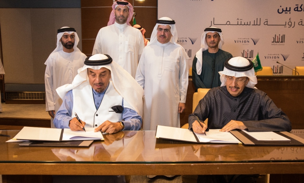 Saeed Mohammed Al Tayer, MD & CEO of Dubai Electricity & Water Authority (DEWA) and Mohammad Abunayyan, Chairman of Vision Invest (formerly ACWA Holding) sign the agreement at the Ritz Carlton Hotel in Riyadh