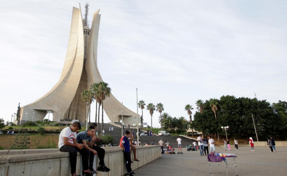 


Youths sit near the Martyrs’ Memorial in Algiers. Nearly 15,000 Algerian doctors work in France now and 4,000 submitted applications to leave their home country last year, according to official figures. — Reuters