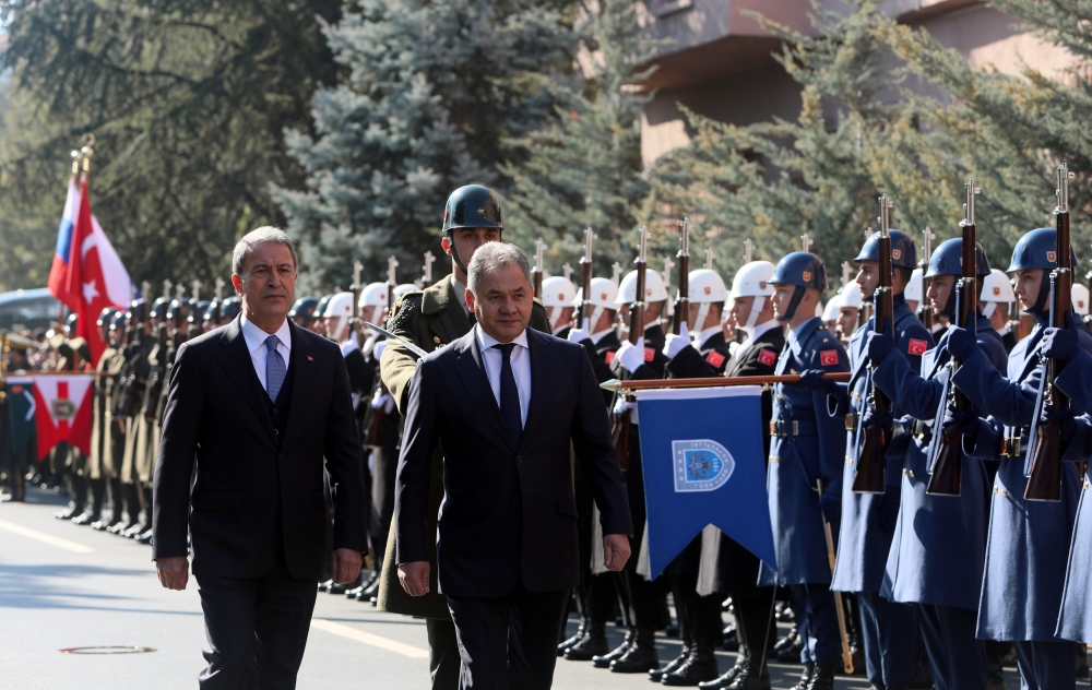 


Turkish Defense Minister Hulusi Akar and his Russian counterpart Sergei Shoigu review a guard of honor during a welcoming ceremony in Ankara, Turkey on Monday. — Reuters