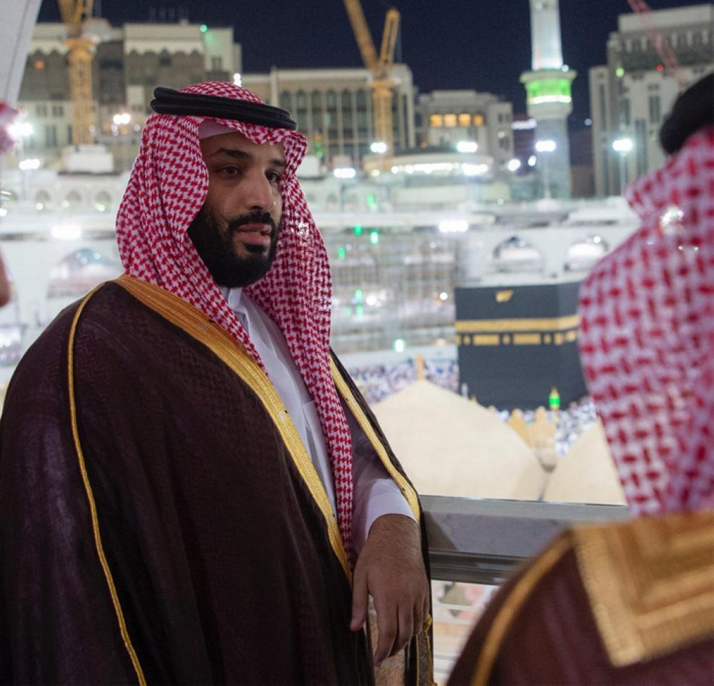 Crown Prince Muhammad Bin Salman, deputy premier and minister of defense, cleans the inner walls of the Kaaba — SPA photo