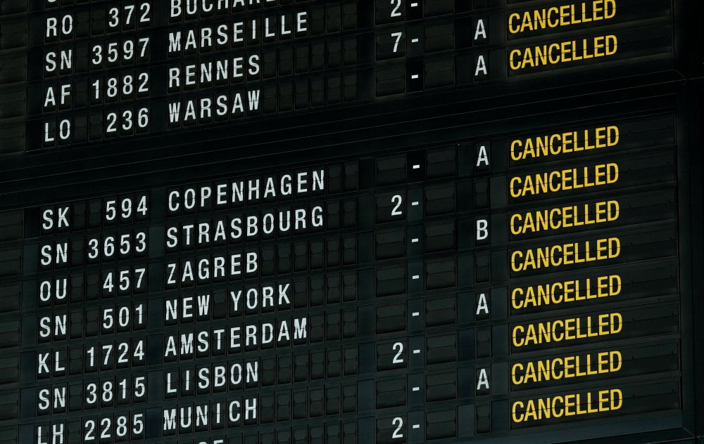 A flight information board displays canceled flights during a strike by Belgian trade unions at Zaventem international airport near Brussels, Belgium, on Wednesday. — Reuters