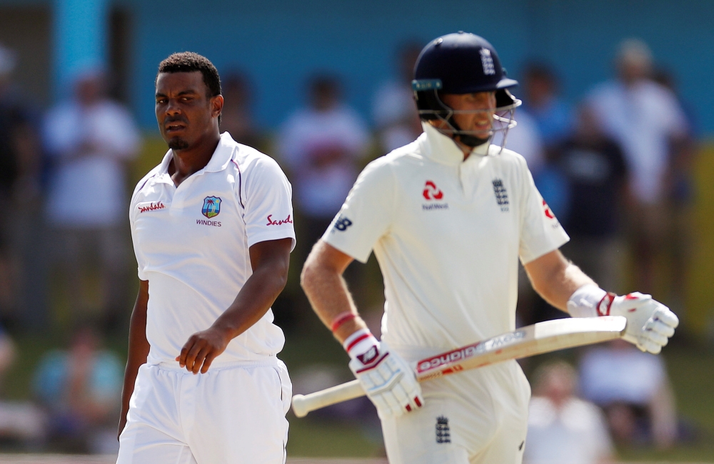 West Indies' Shannon Gabriel with England's Joe Root during the Third Test at the Darren Sammy National Cricket Stadium, St Lucia Action. — Reuters