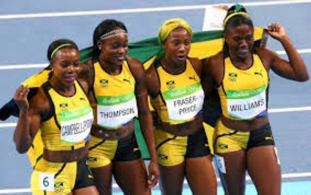 Christania Williams,  Elaine Thompson, Veronica Campbell-Brown and Shelly-Ann Fraser-Pryce of Jamaica celebrate after winning silver in the Women's 4 x 100m Relay at the 2016 RIo Olympics in the thile photo. — Reuters
