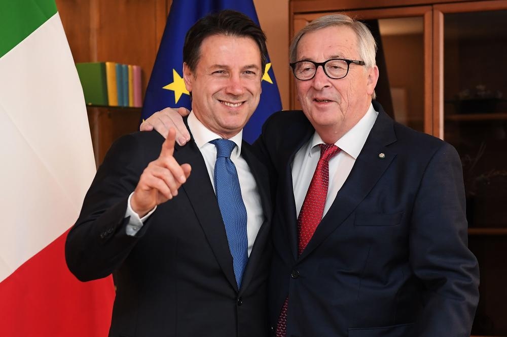 European Commission President Jean-Claude Juncker (R) poses with Italy’s Prime Minister Giuseppe Conte ahead of a debate on the futur of Europe at the European Parliament on Tuesday in Strasbourg, eastern France. — AFP