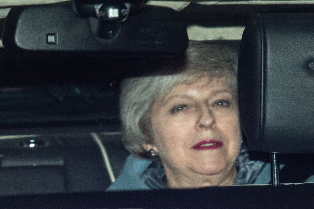 Britain’s Prime Minister Theresa May leaves the Houses of Parliament in London on Thursday after losing a vote on her Brexit withdrawal bill. — AFP