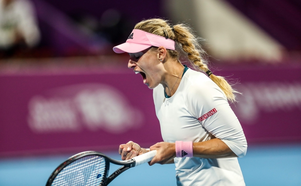 Angelique Kerber of Germany reacts after winning her WTA Qatar Open quarterfinal tennis match against Barbora Strycova of the Czech Republic, in Doha on Thursday. — AFP