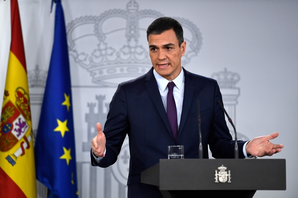 Spanish Prime Minister Pedro Sanchez holds a press conference after a cabinet meeting at the Moncloa Palace in Madrid on Friday. — AFP