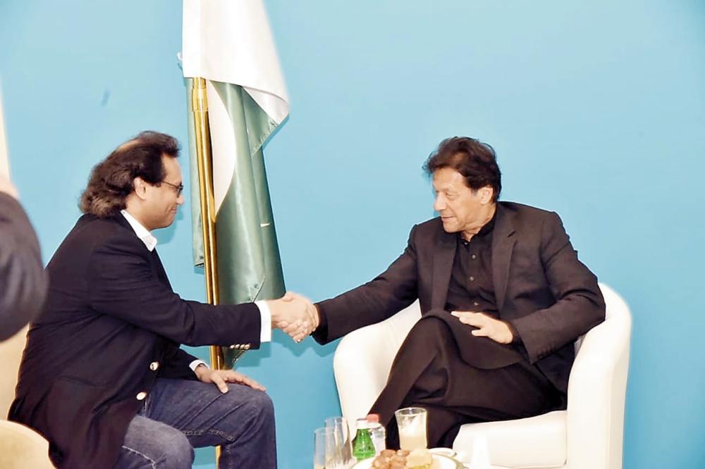 Pakistani Prime Minister Imran Khan in conversation with Jameel Altheyabi, Editor-in-Chief of Okaz & General Supervisor of Saudi Gazette Editorial. — Okaz/SG photo