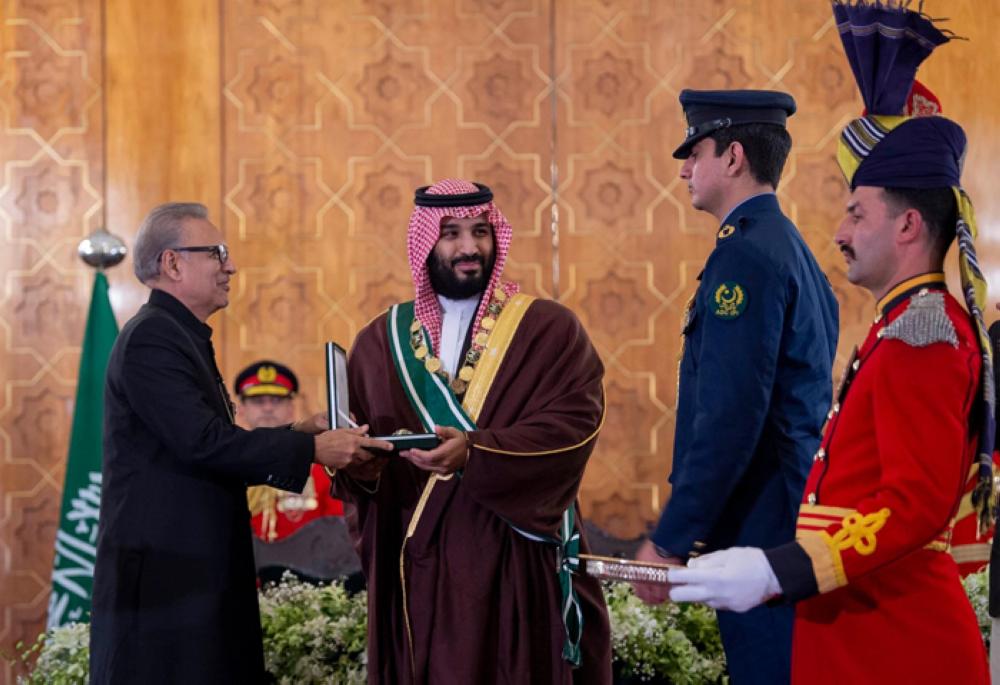 President Arif Alvi conferring Pakistan’s highest civil award — Nishan-e-Pakistan — on Crown Prince Muhammad Bin Salman for his “outstanding support for reinvigorating Pak-Saudi bilateral relationship.” — SPA
