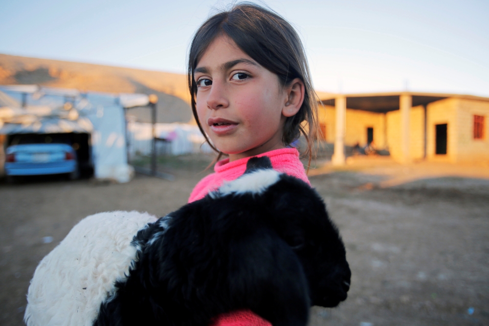 


A Yazidi girl who was kidnapped by Daesh (the so-called IS) militants is seen in a refugee camp on Mount Sinjar, Iraq. — Reuters photos