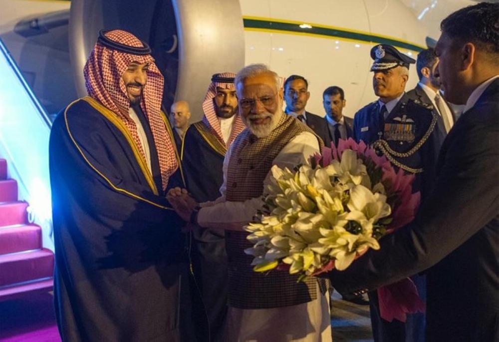 Crown Prince Muhammad Bin Salman, deputy premier and minister of defense, being received by Indian Prime Minister Narendra Modi at Air Force Station Palam airport in New Delhi on Tuesday evening. — Courtesy photo