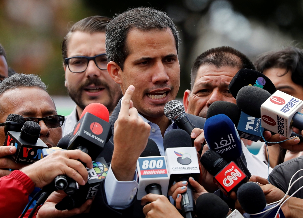 Venezuela's opposition leader Juan Guaido, who many nations have recognized as the country’s rightful interim ruler, speaks to the media during a protest of the public transport sector against the government of Venezuela’s President Nicolas Maduro in Caracas, Venezuela, on Wednesday. — Reuters