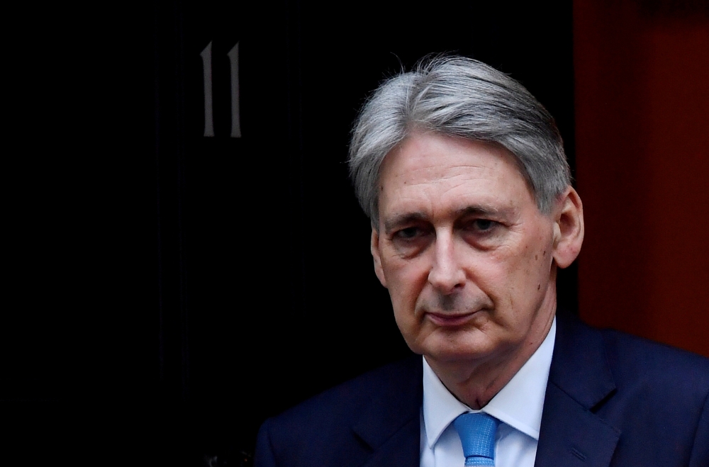 Britain’s Chancellor of the Exchequer Philip Hammond is seen outside Downing Street in London, Britain, in this Jan. 30, 2019 file photo. — Reuters